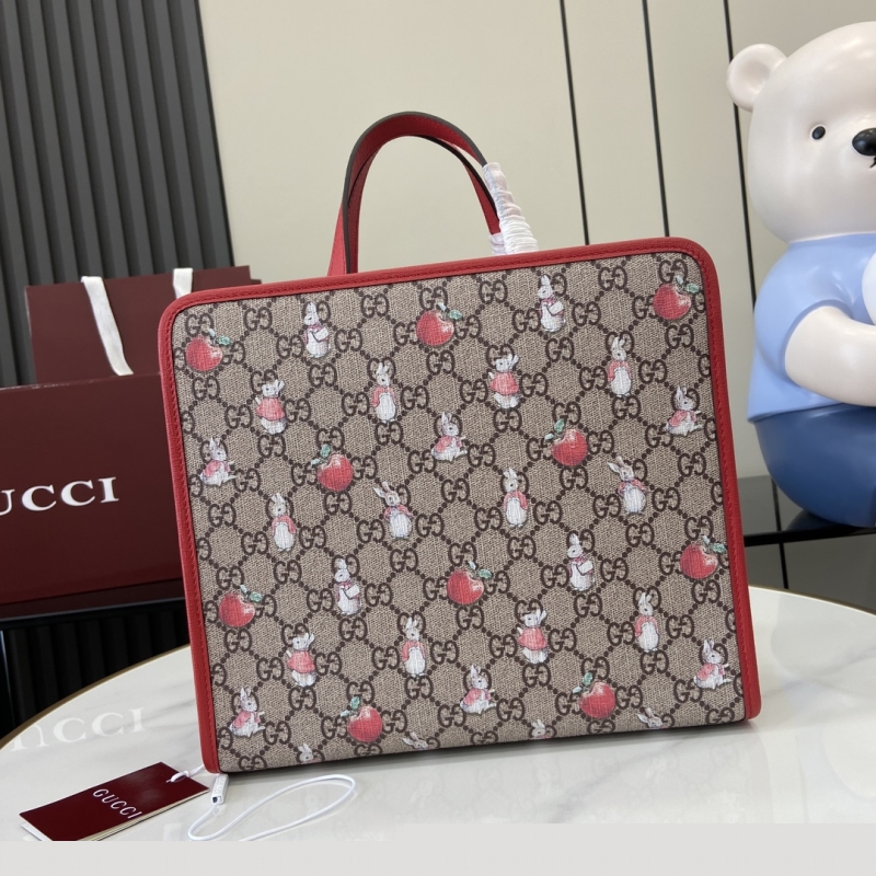 G*u*i shopping bags
